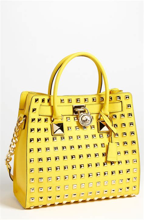 michael kors yellow leather tote|Michael Kors black leather handbag.